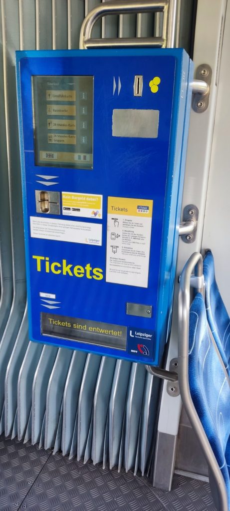 Tickets kiosk inside the bus that you would use while taking trains in Germany